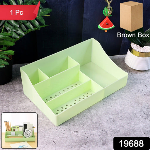 Multi-section plastic organizer storage tray holding pens and stationery