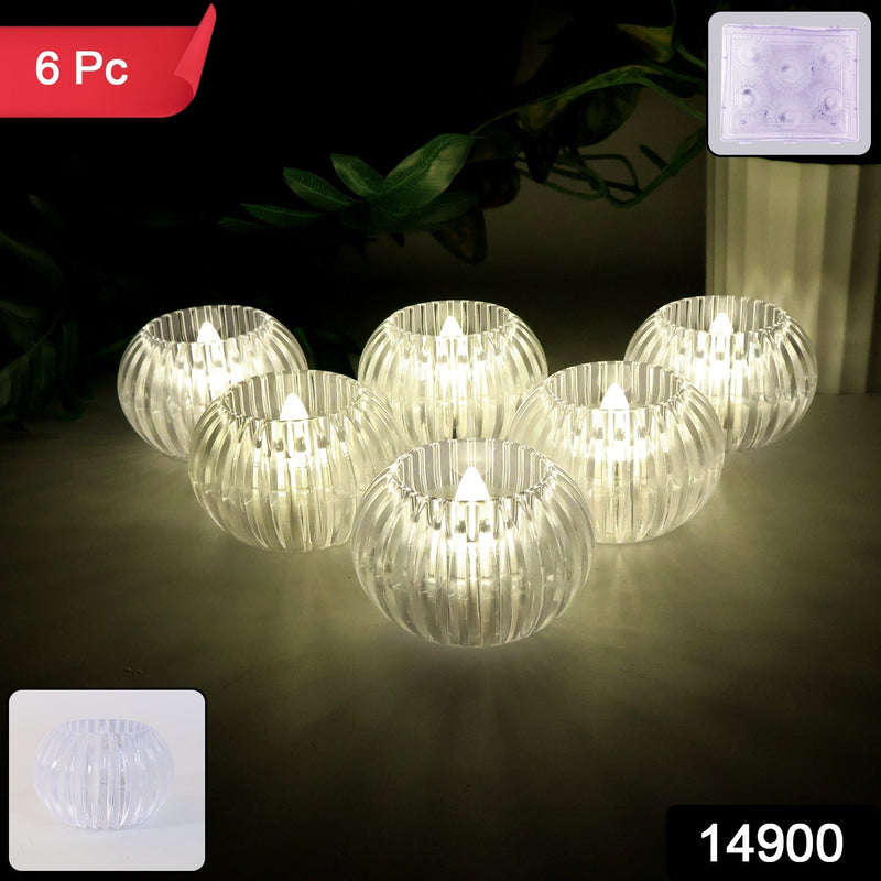 Close-up of crystal design LED flameless tealight candle glowing warmly