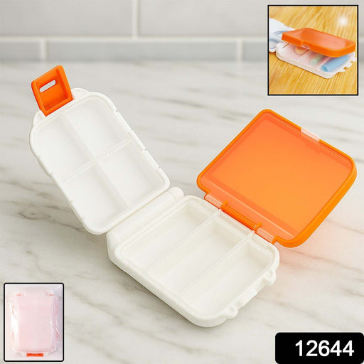 Side view of compact orange portable pill organizer box closed