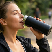 Leakproof steel water bottle with one-click lock lid