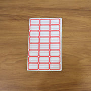 Close-up showing multiple sheets of blank writable self-adhesive shipping label stickers