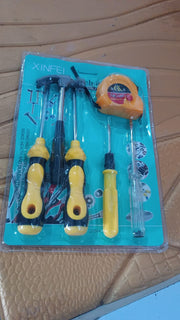 Close-up of hand tool kit components for household repairs