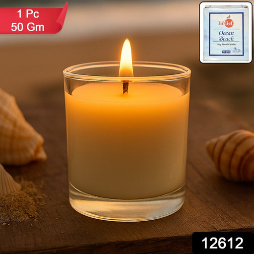 Lit votive candle with a warm, steady flame, creating a serene ambiance.