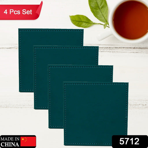 A hot tea cup resting on a Siplix Leather Tea Coaster, protecting the wooden coffee table surface.