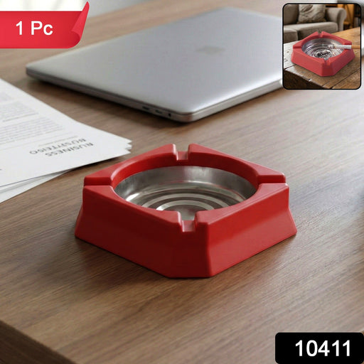 Compact heat-resistant ashtray placed on a modern home office desk