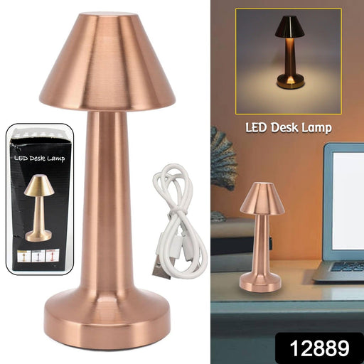 Portable LED table lamp illuminating a modern bedside table.