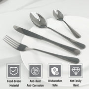 Elegant dining table arrangement with polished stainless steel cutlery