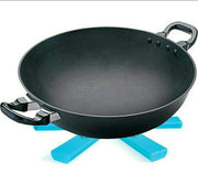 Portable foldable hotmat protecting a dining table from a serving dish.