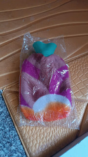 Hot water bottle bag showing durable rubber and protective soft cover