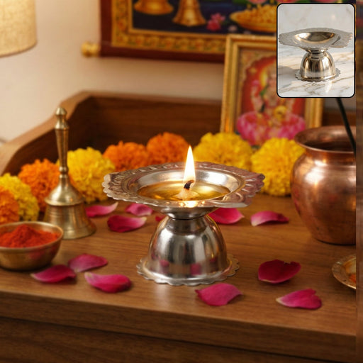 Traditional stainless steel puja diya stand with polished finish