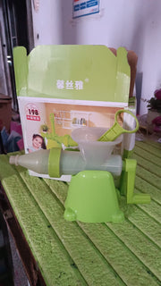 Angled view of manual juicer on white background