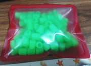 Unboxed luminous glow tyre valve caps illustrating universal design