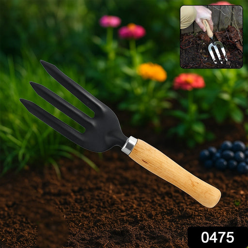 Close-up view of the sharp metal tines of the hand weeding fork for effective weed removal.