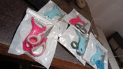 The versatile kitchen scissor, designed for easy handling and various cutting tasks.