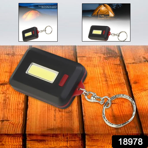 Mini LED keychain light with secure flash hook attachment