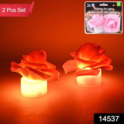 Close-up of rose-shaped LED tealight candles emitting flickering light
