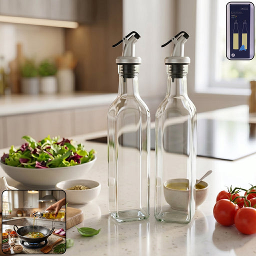 Transparent square glass oil dispenser bottles with stainless steel spouts for kitchen use