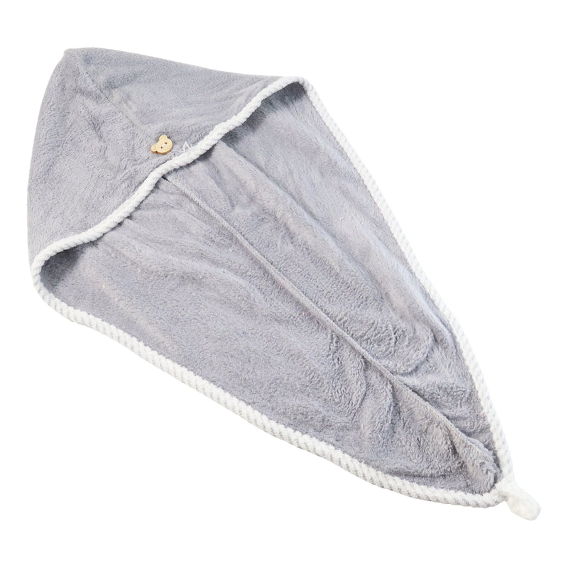 Folded quick-dry hair towel in a vibrant pink color.