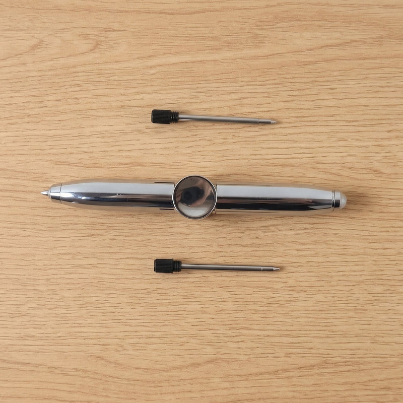 Compact multifunction spinner pen for stress relief and writing