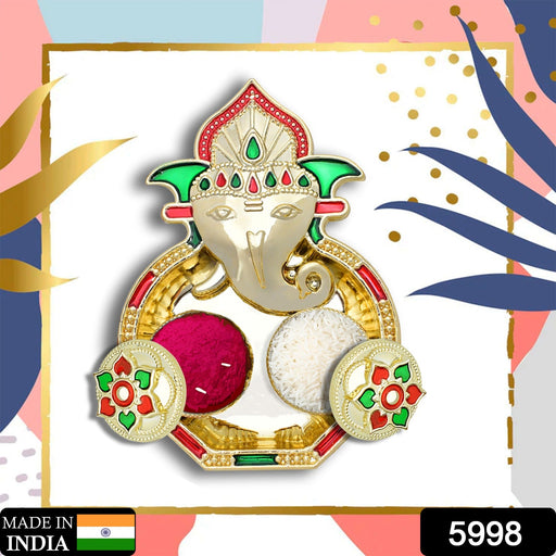 Decorative Puja Thali with small kumkum holders, ideal for festive celebrations.
