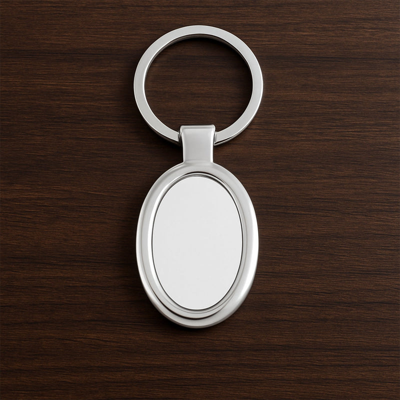 Sleek oval metal keychain showcasing durable build and chrome shine