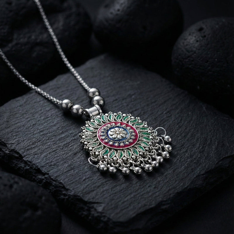 Antique silver-tone floral mandala pendant necklace with enamel accents and hanging ghungroo beads