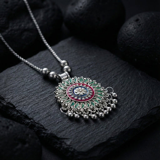 Antique silver-tone floral mandala pendant necklace with enamel accents and hanging ghungroo beads