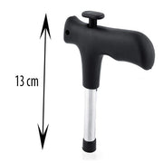 Stainless steel coconut driller tool with a sturdy grip.