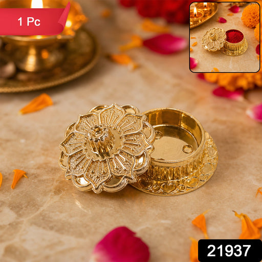 Side view of golden kankavati with lid for pooja rituals