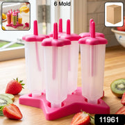 Close-up of BPA-free plastic popsicle molds filled with juice ready to freeze