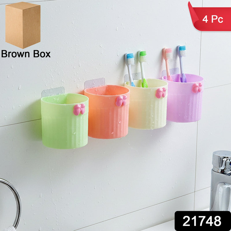 Bathroom toothbrush organizer set mounted on wall with toothbrushes and toothpaste