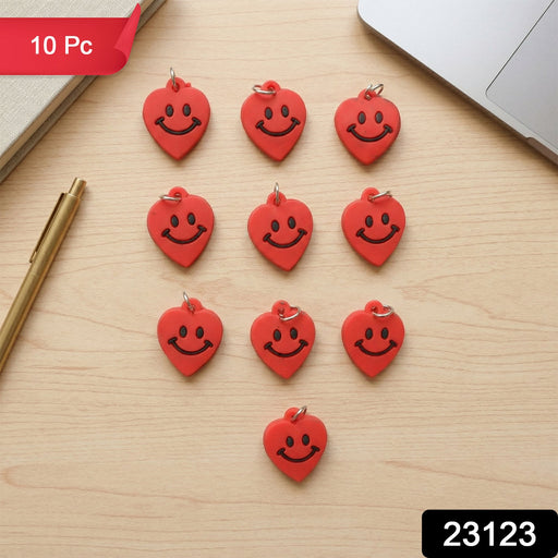 Set of two vibrant heart-shaped smiley keychains
