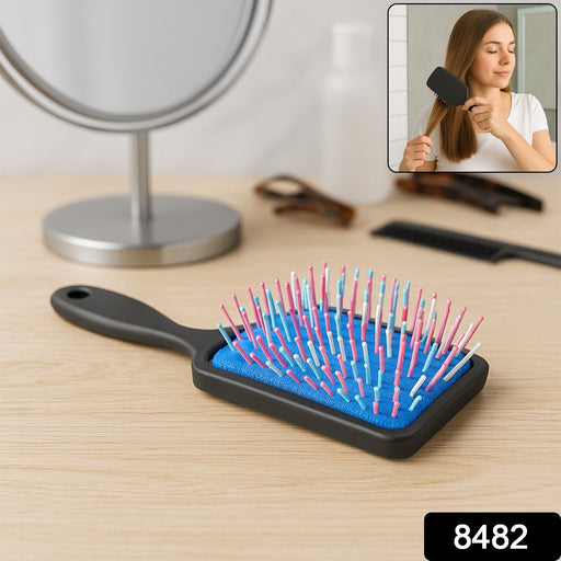 Side view of the ergonomic handle on the Scalp Massager Comb for comfortable grip.