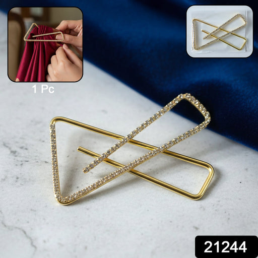 Elegant golden triangle brooch safety pin close-up with crystal detailing