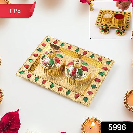 Beautifully designed plastic kumkum thali, perfect for Indian pooja rituals.
