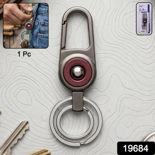 Close-up of metal key holder with sleek modern finish and secure locking carabiner
