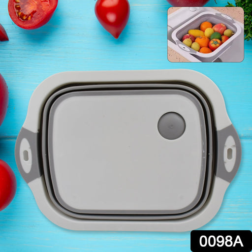Multi-functional collapsible cutting board used as a dish washing basin.