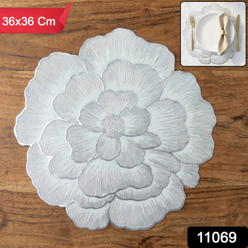 Close-up of round floral PVC placemat, stylish and protective