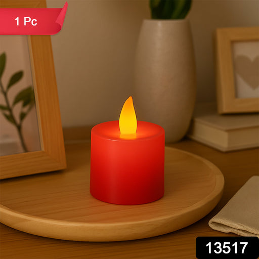 Close-up of a red flameless LED tea light, showing the realistic flickering effect.