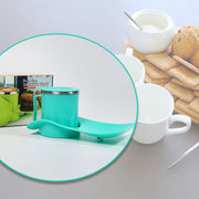 Happy kids enjoying their snacks and drinks using the convenient snack tray with steel cup.