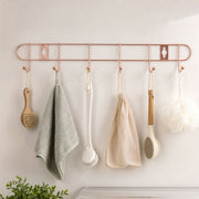 Wall mounted hook rail for towels and utensils